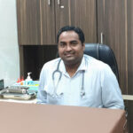 Dr. Roshan J. Machado (Director)